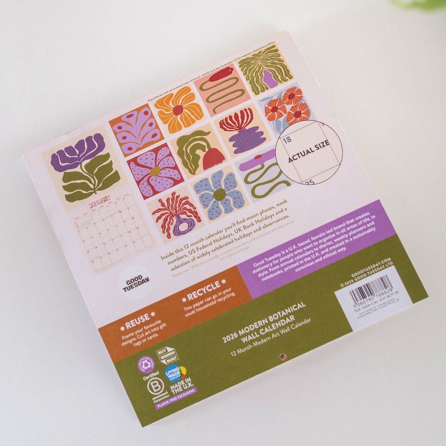 BAck vieew of the Botanical Flower Wall Calendar 2026 featuring 12 months of floral illustrations, moon phases, holidays, and planning details, perfect for desk or office décor