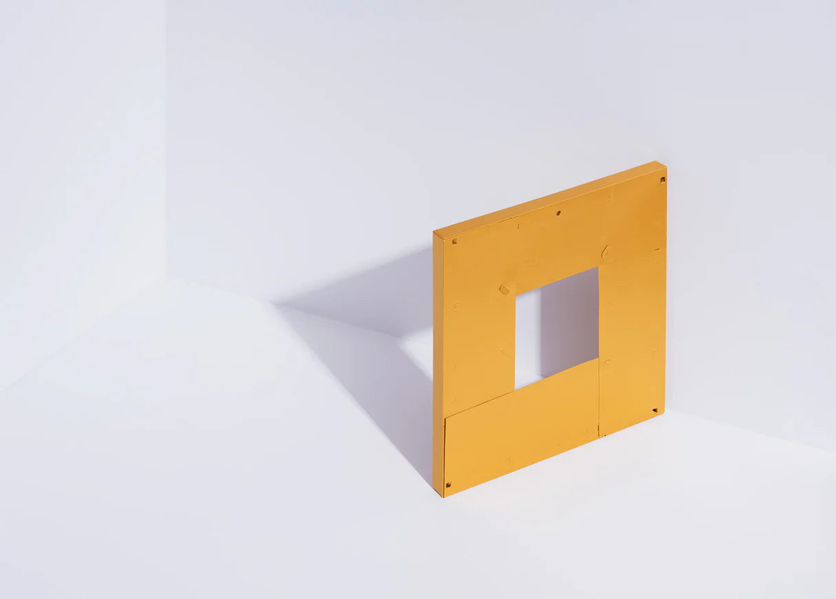 Back view of the orange Customizable Small Frame Kit, showing assembly and mounting details.