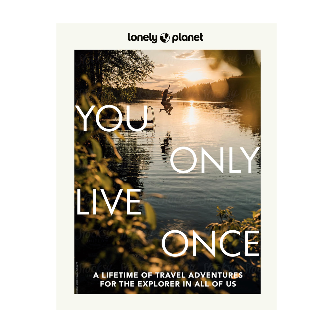Lonely Planet travel guide You live only oncer book cover with a person jumping into a lake at sunset.