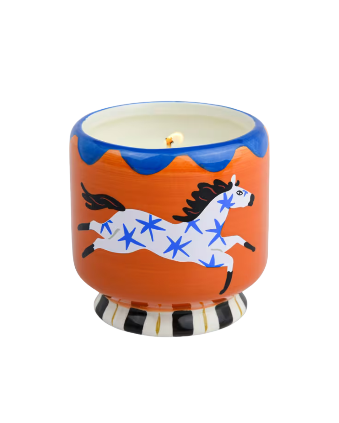 “A Dopo Horse Soy Wax Candle in hand-painted ceramic vessel with white horse and blue motif on orange background, displayed on white backdrop.”