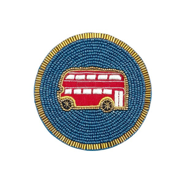 Beaded round coaster with red London bus design, durable and stylish, ideal gift for London lovers and home decor
