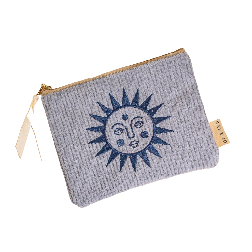 A light blue striped corduroy pouch with a blue sun face design, featuring a zipper closure displayed against a white background