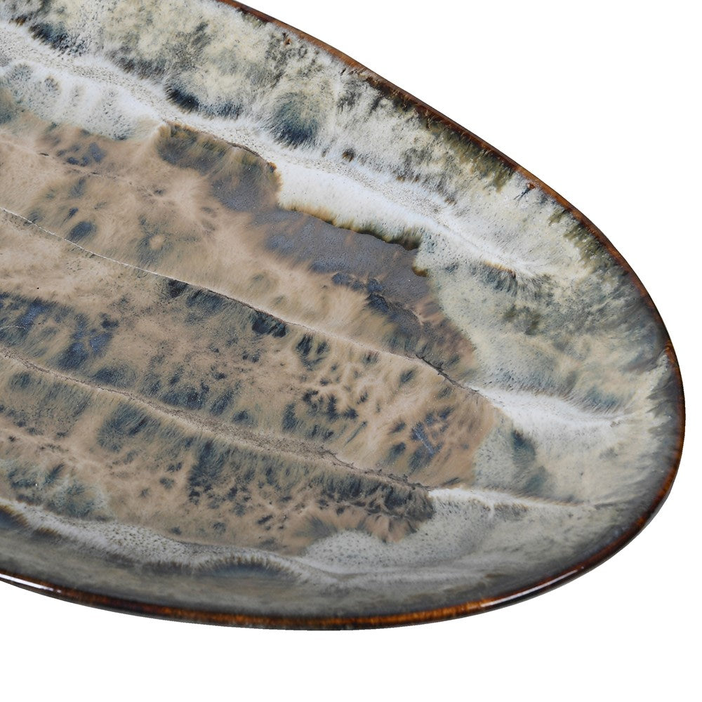 Close-up of the Ocean Glazed Decorative Plate in ceramic with ocean-inspired glaze. Decorative centerpiece plate, not food-safe.