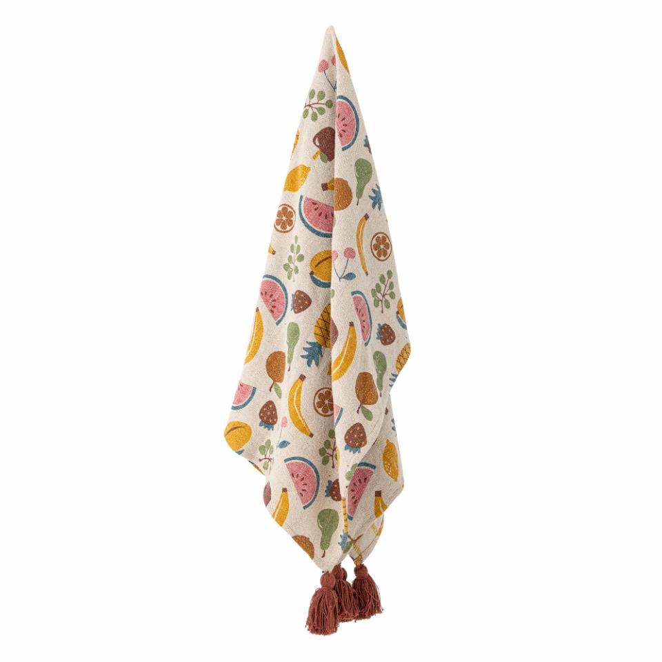 Fruit patterned throw with tassels on a white background