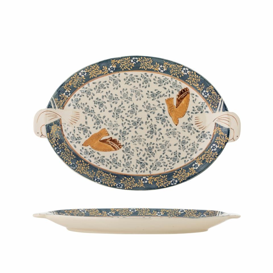 Decorative ceramic platter with floral patterns and bird designs on a white background