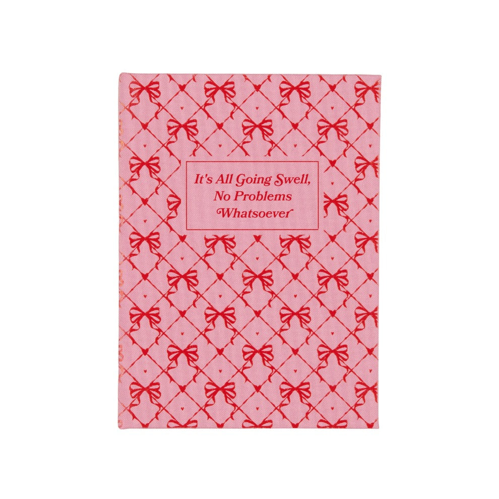 Self Help Notepad – It’s All Going Swell, closed, showing bookcloth cover and printed spine.