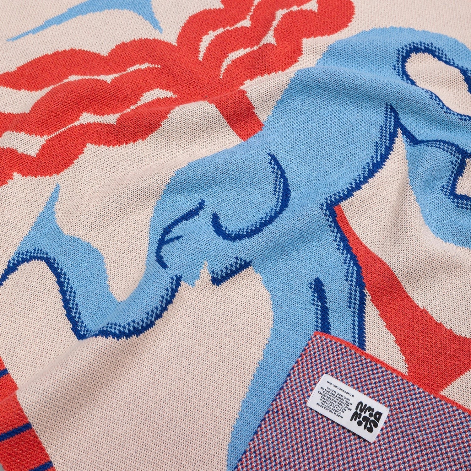 Close uop of the  Jellyphant Mini Blanket 30x40 inches, designed by Roisin O&