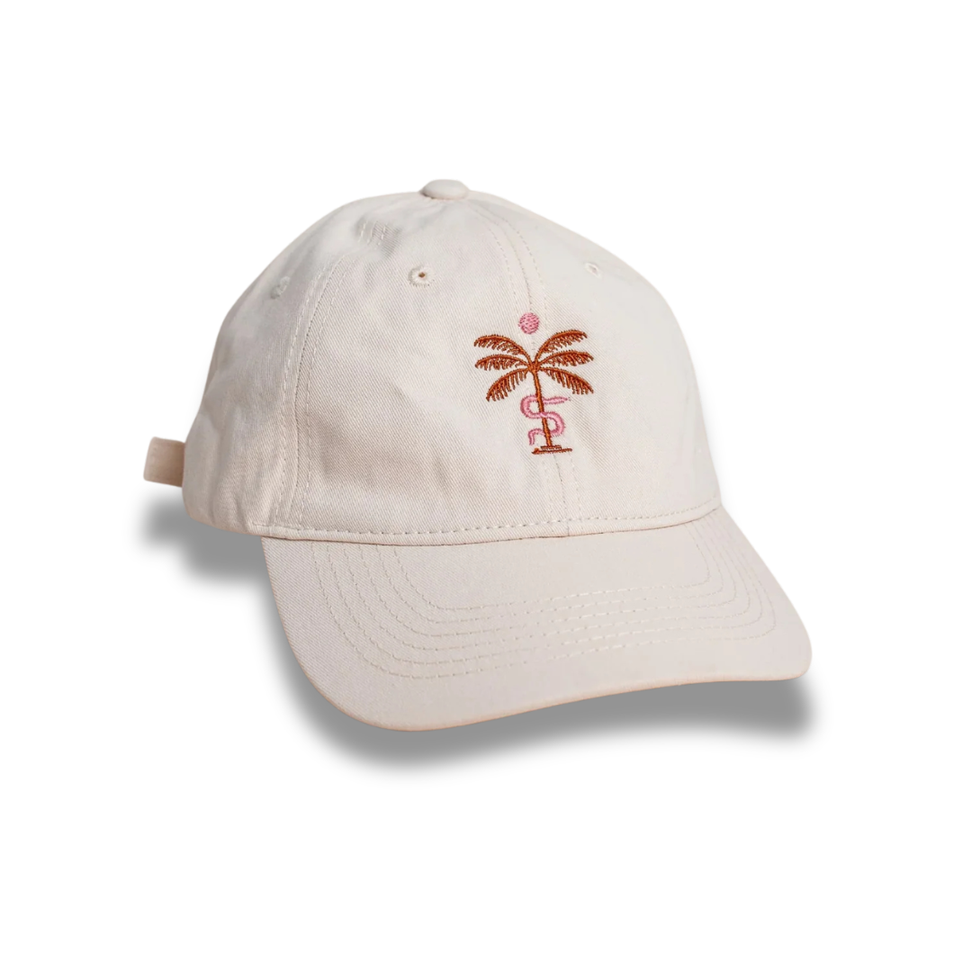 Off White cap with a palm tree and pink snake design on a white background