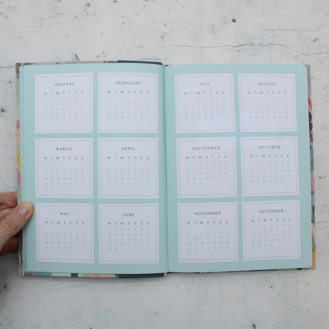 Annula Calendar of the A5 2026 diary with neon floral ornate garden design inspired by V&A archives,