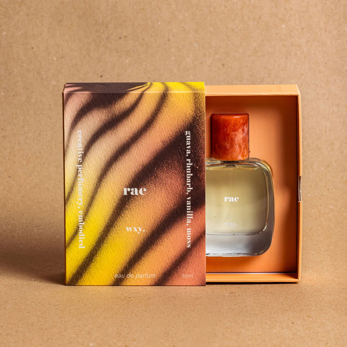 Rae Eau de Parfum bottle inside the gift box – vibrant tropical fragrance