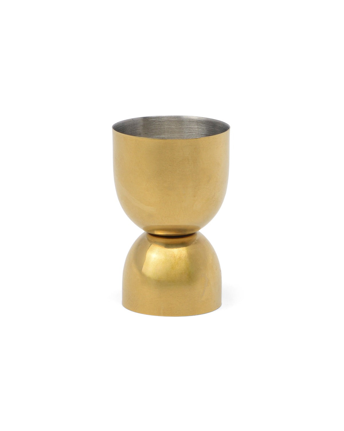 gold stainless steel jigger on a white background