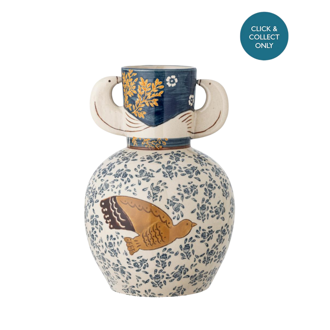 A hand-decorated ceramic vase with blue floral patterns and a bird motif in brown and yellow colors on a white background.