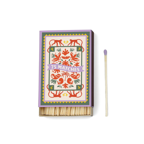 Decorative matchbox with monkey and floral design, labeled seventy-five matches, with lavender-tipped matchstick