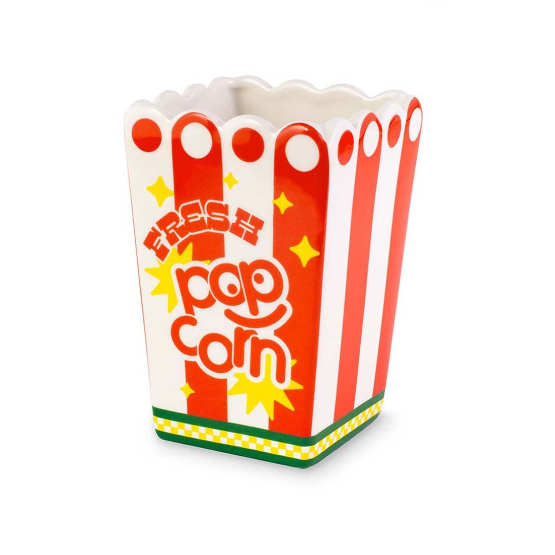 A ceramic vase designed to resemble a popcorn bag with red and white stripes, yellow stars, and the text &