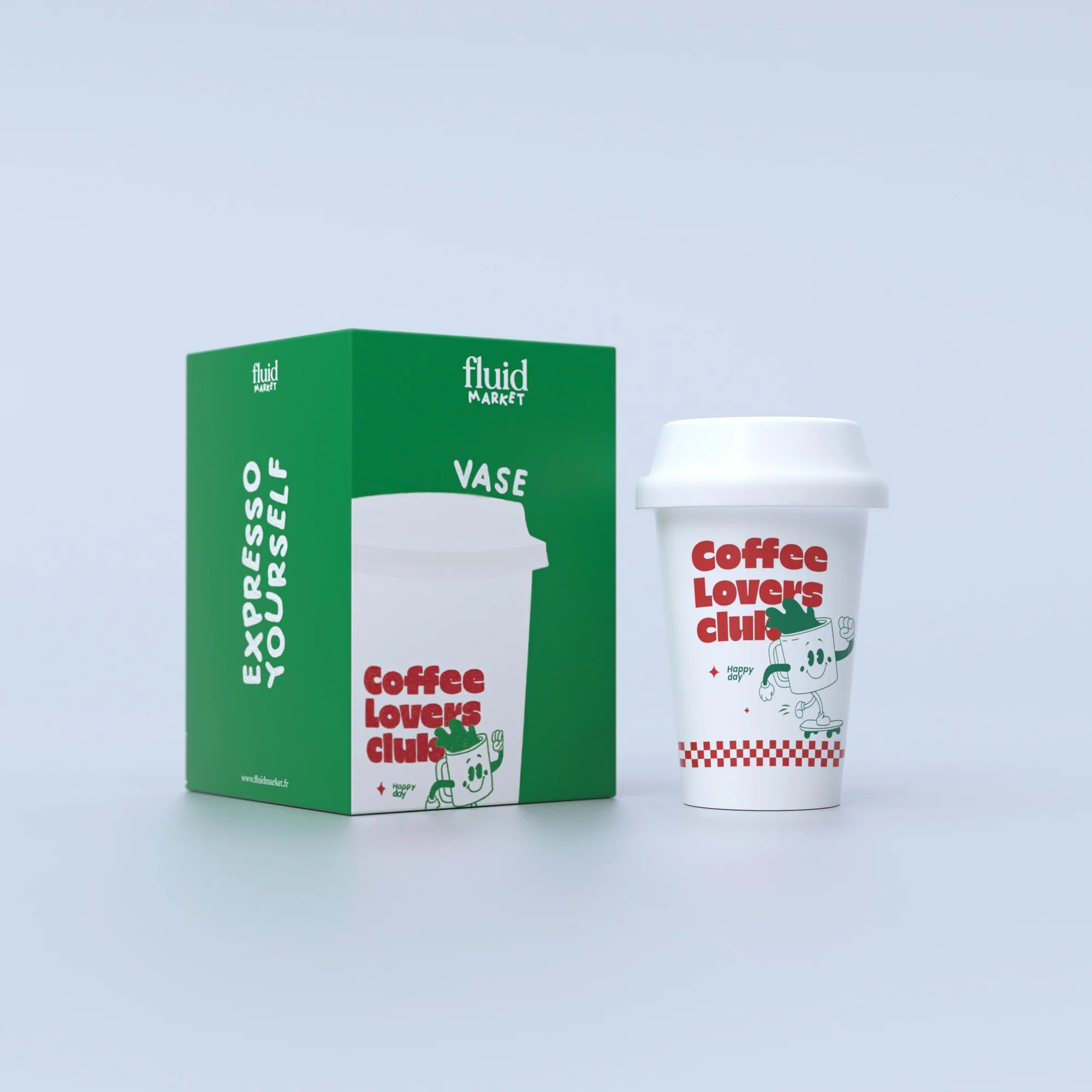 A white ceramic cup with a red and green graphic that includes a coffee mug and the text &