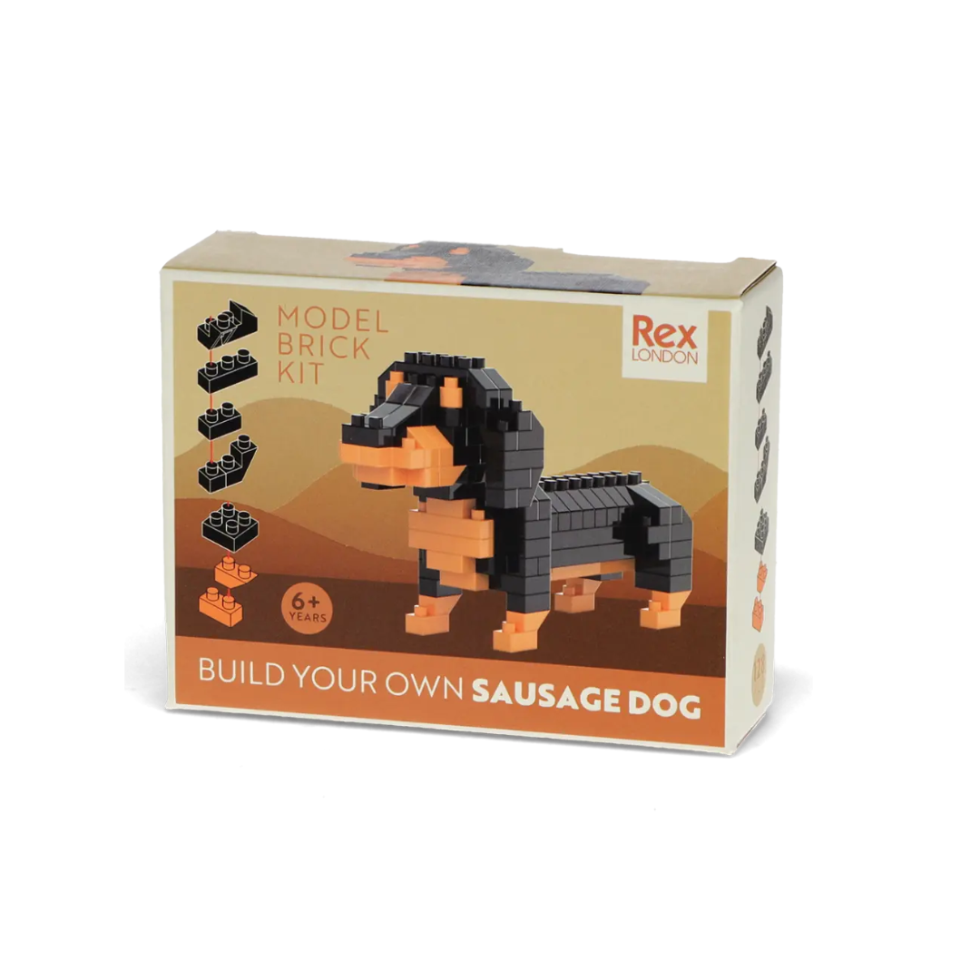 Model brick kit packaging for a sausage dog with Rex London branding on a white background