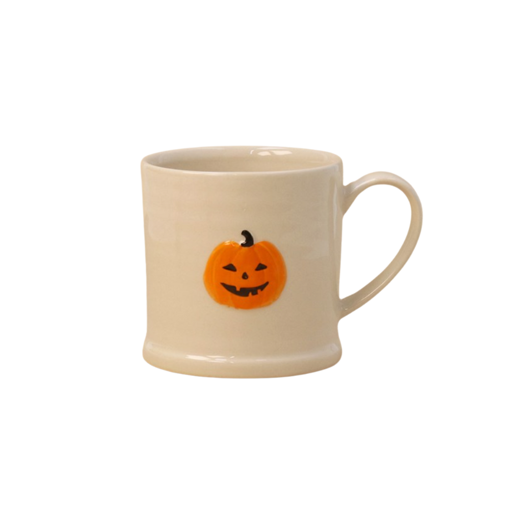 Pumpkin Face Stoneware Mug , cozy autumn and Halloween mug made from durable stoneware, displayed on a white background.