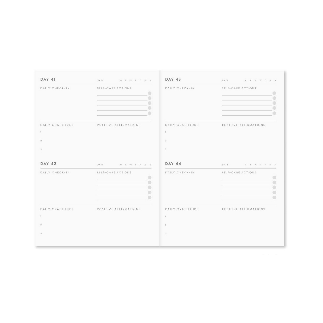 Open 365 Self Care Journal teal marble edition showing daily self-care prompts, gratitude, and affirmation sections