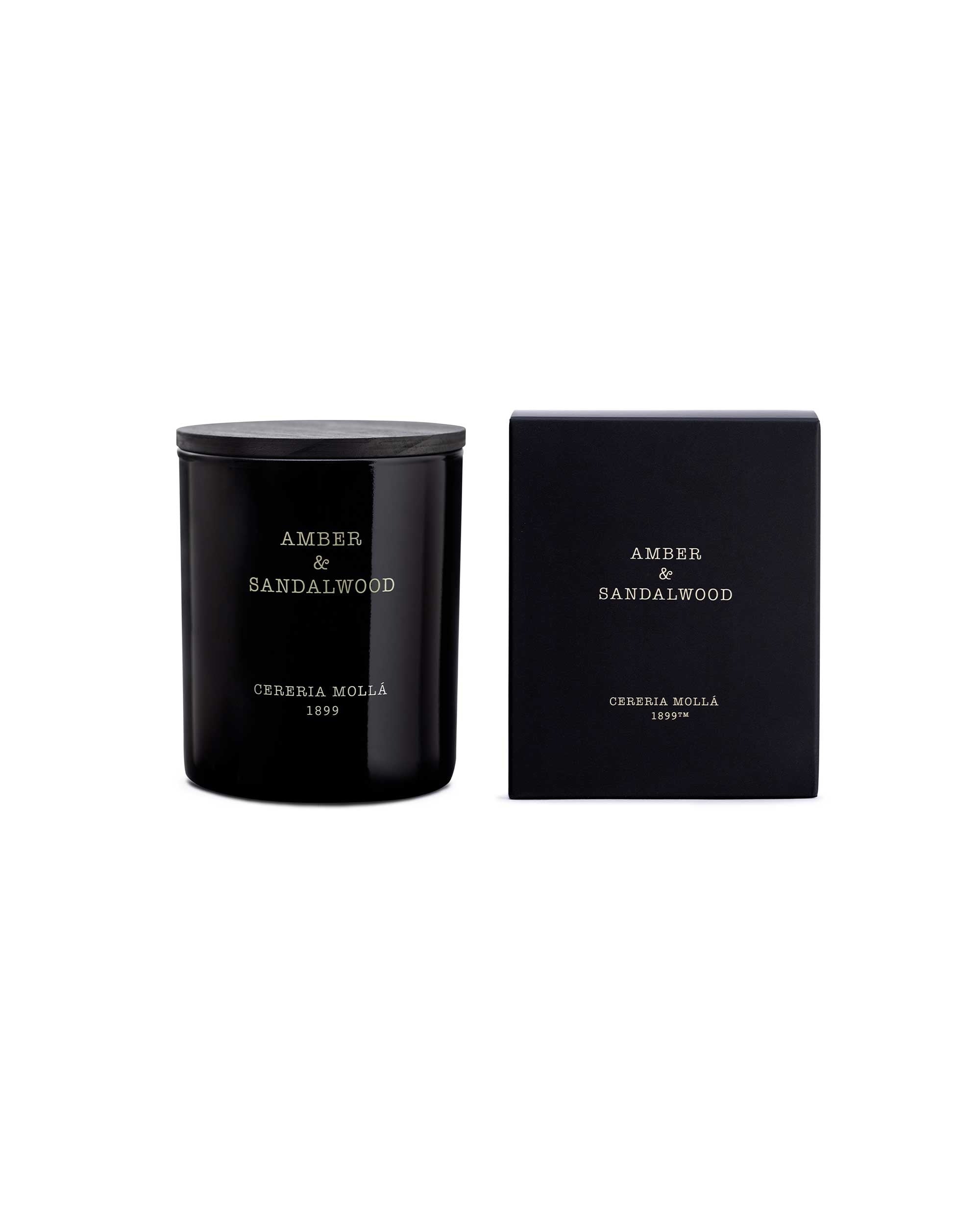 Black glass candle and packaging with &