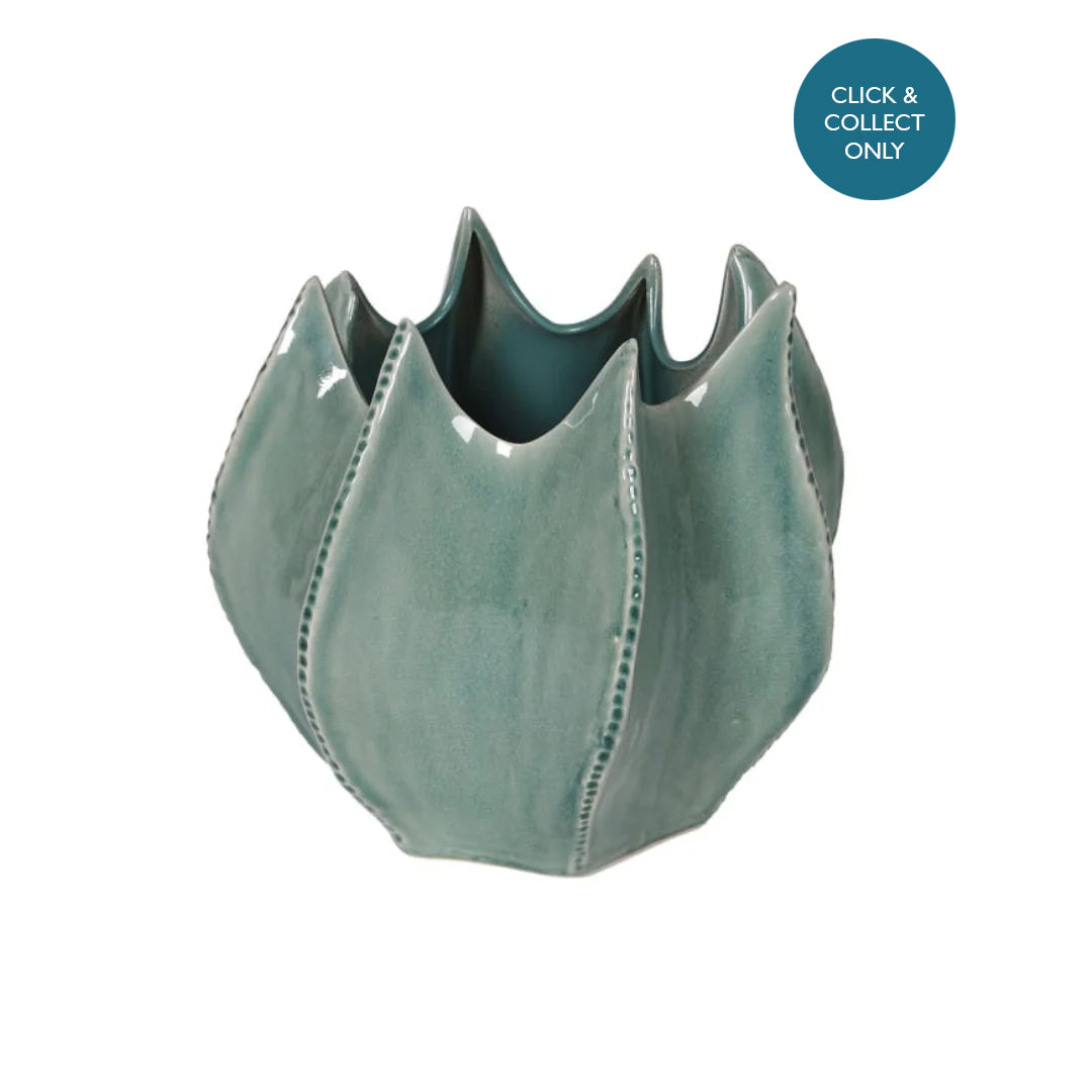 A green glazed ceramic vase with a wavy design, suitable for click and collect only.