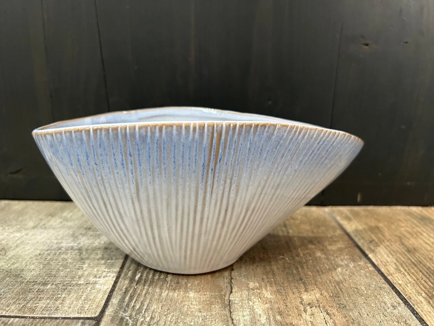 Back view of the Blue ombre stoneware shell bowl with seashell-inspired design, decorative coastal-style centrepiece for home décor on a white background