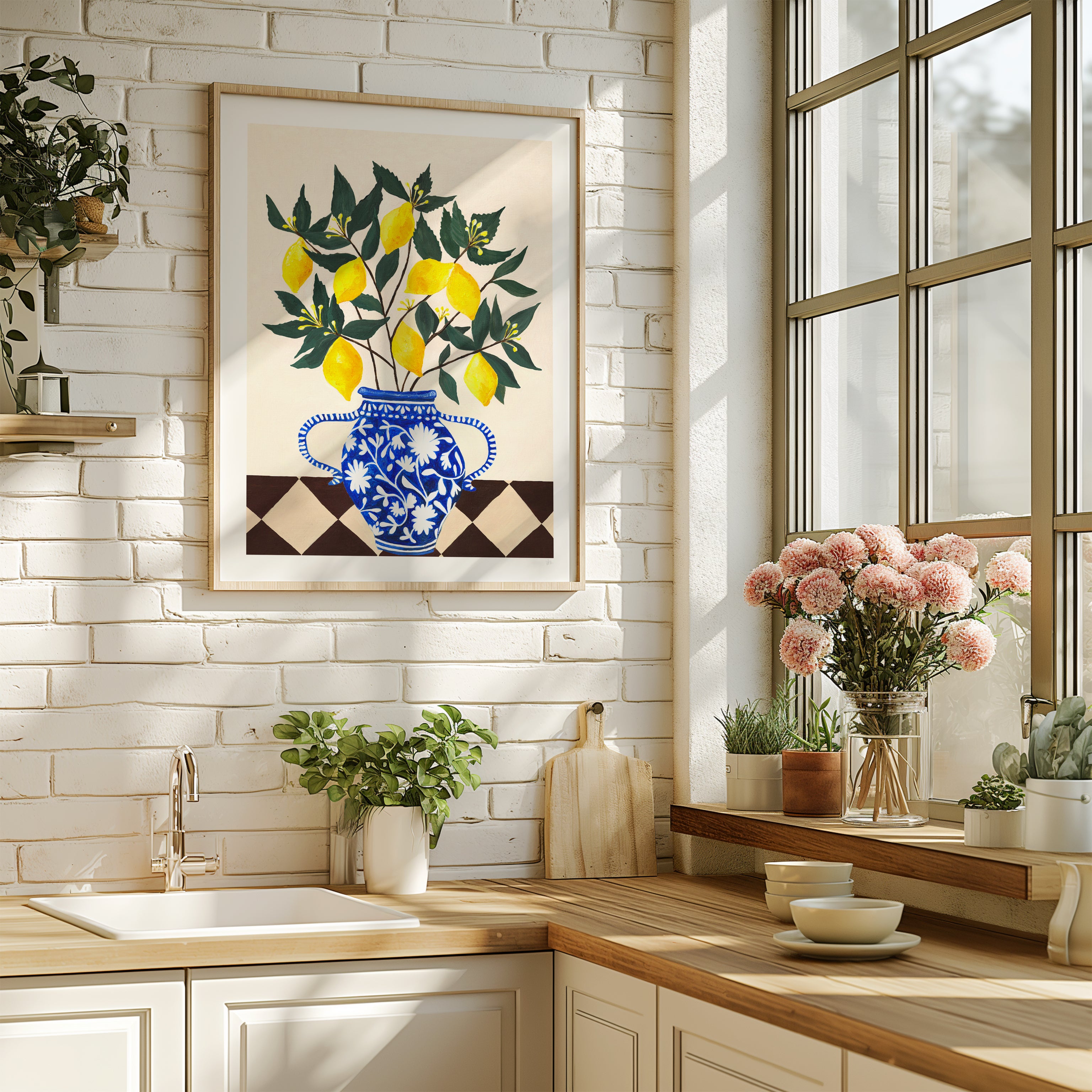 Kitchen interior with a decorative painting of lemons and a blue floral vase, plants, and a window.