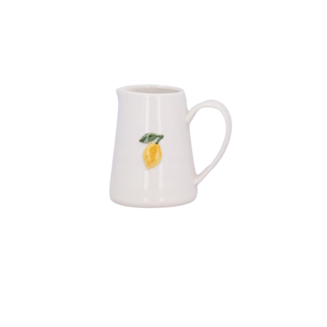 Mini ceramic jug with embossed lemon design, perfect for summer table settings or citrus-themed decor.