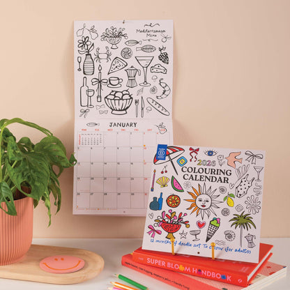2026 colouring wall calendar with month-to-view layout and illustrations to colour
