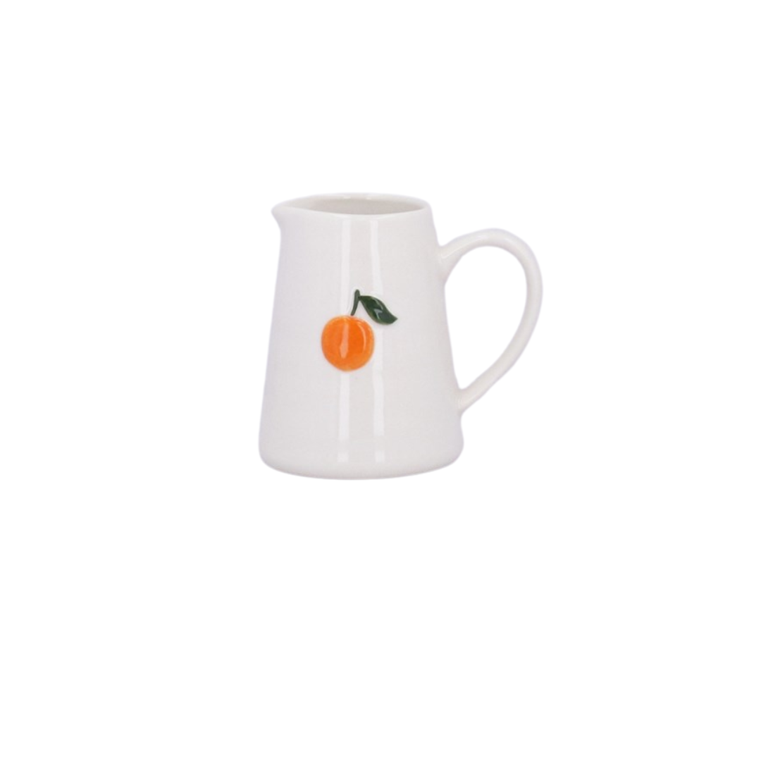 Mini ceramic jug with embossed orange design, perfect for summer table settings or orange-themed decor.

