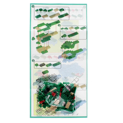 Model building kit for the Tyrannosaurus Rex Dinosaur Brick Building Kit with green blocks and instructions on a white background