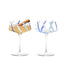 Two azure swirl champagne glasses filled with champagne on a grey background