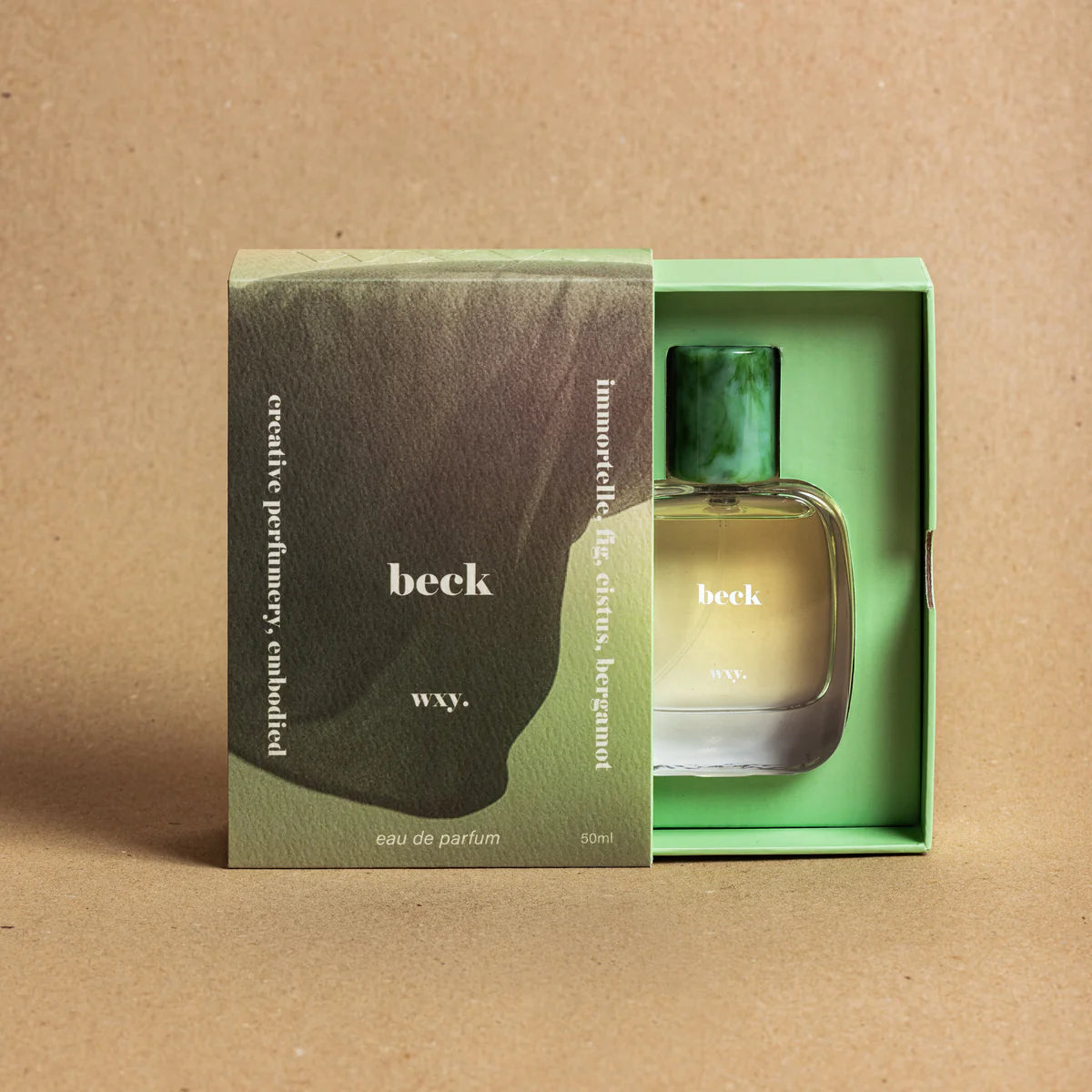 Beck Eau de Parfum 50ml bottle  inside the gift box on a brown background