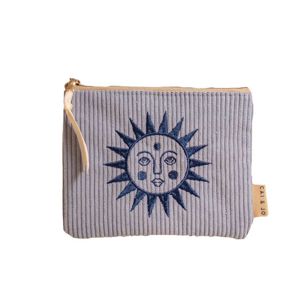 A light blue striped corduroy pouch with a blue sun face design, featuring a zipper closure displayed against a white background