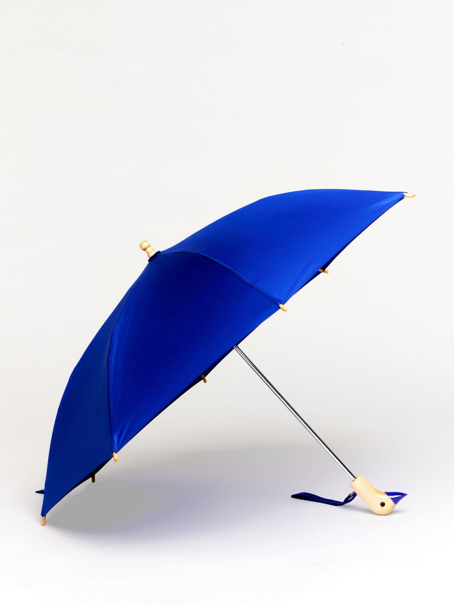 The Duckling children’s umbrella in brightblue with recycled plastic canopy and wooden handle