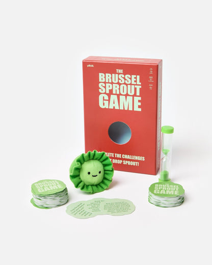 Brussel Sprout Game components including a red box, green tokens, and a timer on a white background