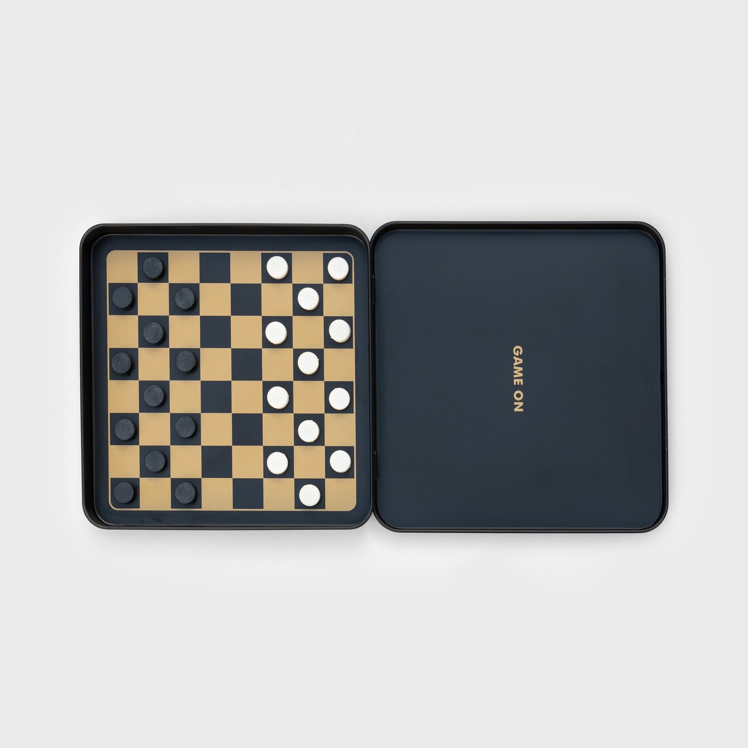 Checkers game set in a black tin with &