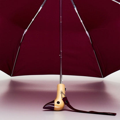 Close Up of the Cherry Duck Compact Umbrella automatic open button – easy, quick operation for travel and everyday use