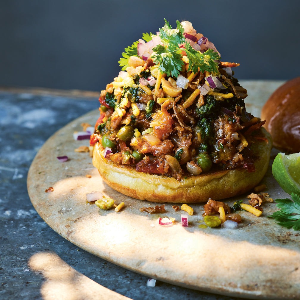 Open sandwich with curry powder on a stone surface with a dark background