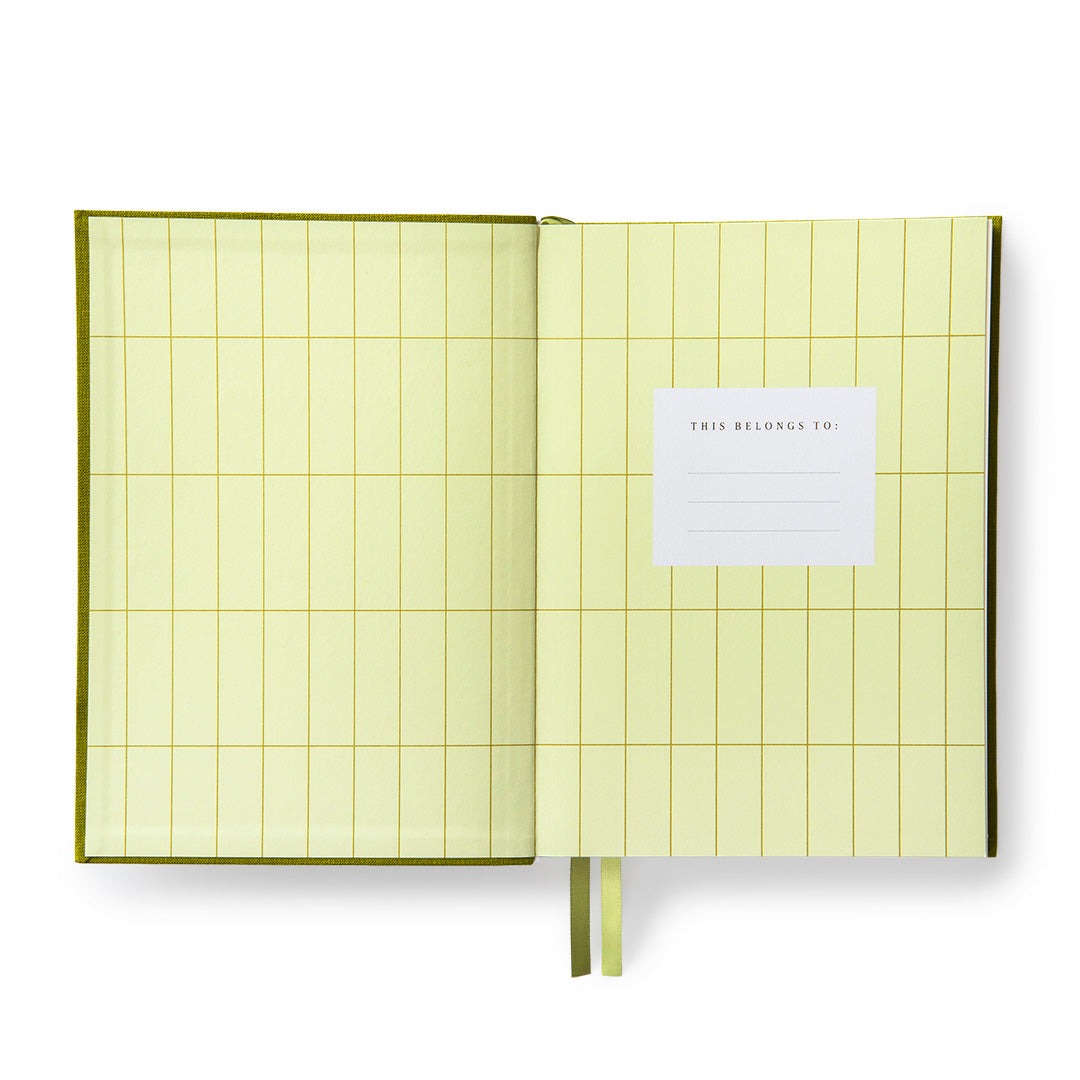 
olive Fabric Daily Planner B6 open to the “This Planner Belongs To” 