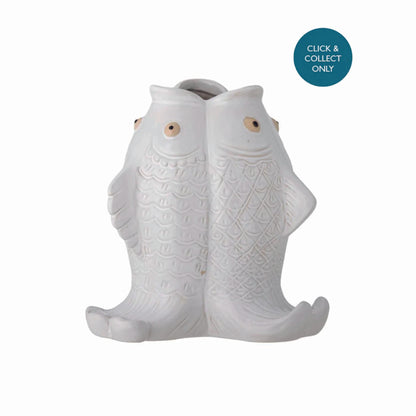 White ceramic fish-shaped  on a white background with &