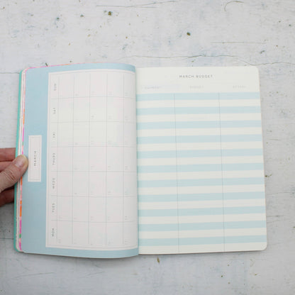 Inside view of the monthly planner of the A5 2026 diary with neon floral ornate garden design inspired by V&amp;A archives