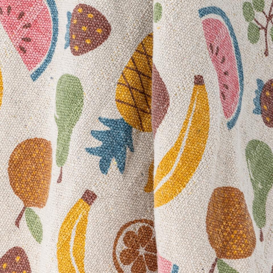 close up of the co-friendly recycled cotton blanket with playful fruit pattern”
