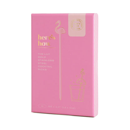 Pink gift box containing set of 4 Lily Flamingo Cocktail Picks on a white background – tropical cocktail accessories