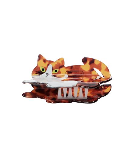 Cat-shaped hair clip on a white background