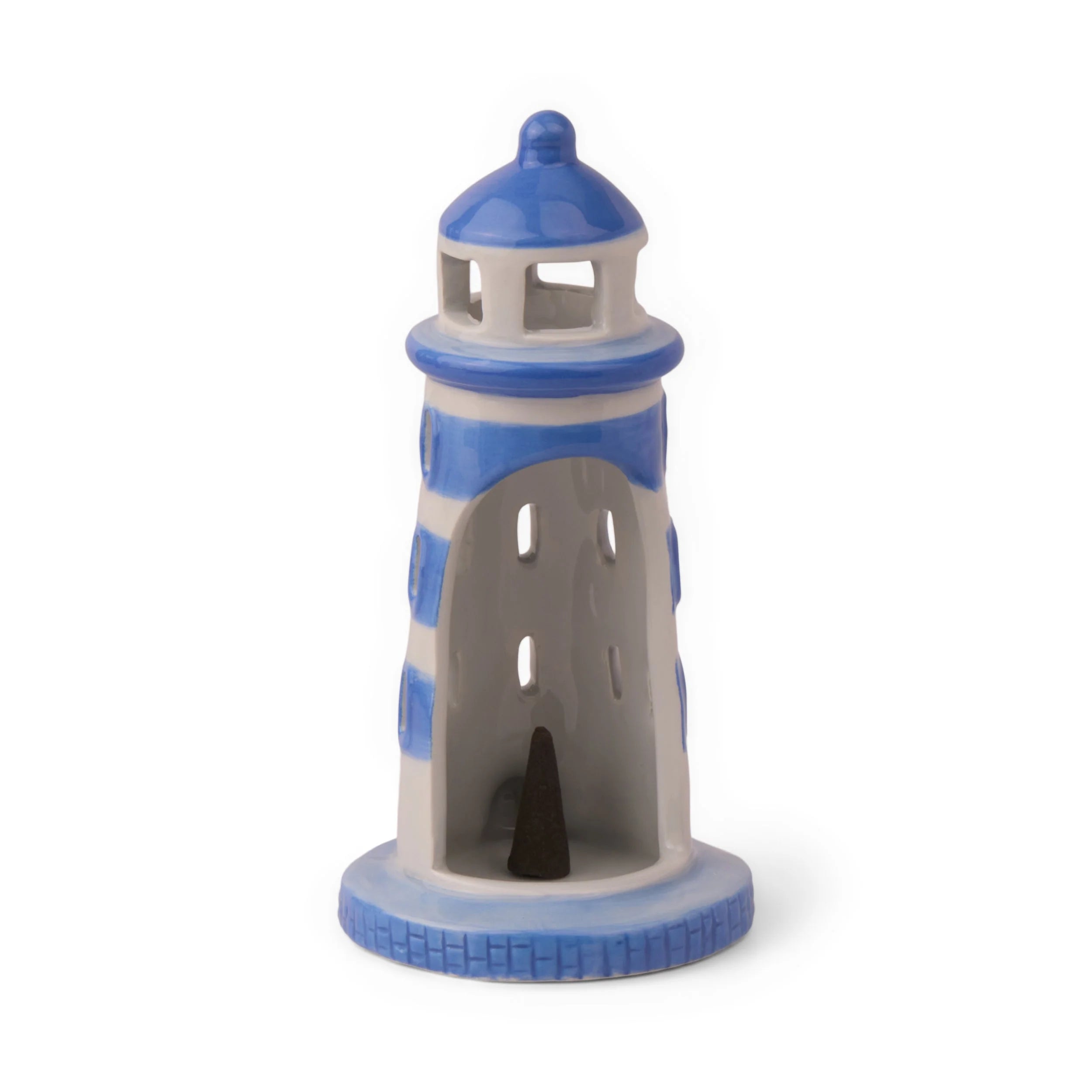 Back view of lighthouse incense holder showing interior with incense cones placed inside