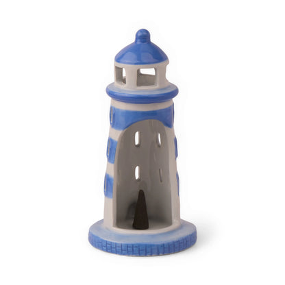 Back view of lighthouse incense holder showing interior with incense cones placed inside