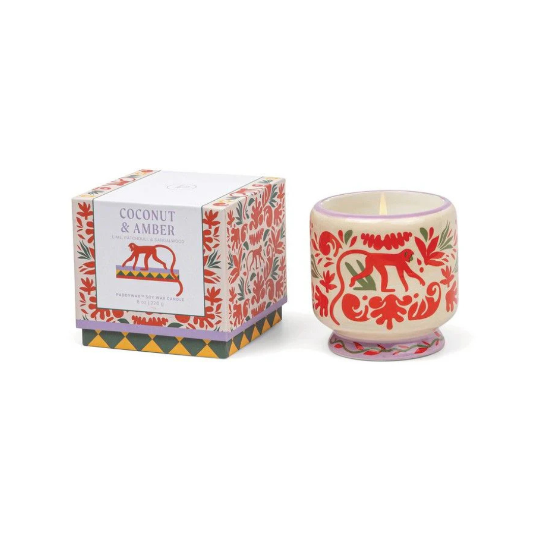 Vegan 8oz soy candle in repurposable ceramic jar with red monkey, coconut &amp; amber scent