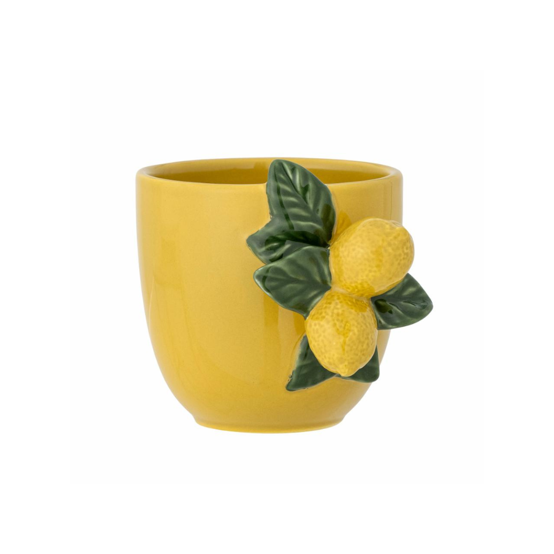 Yellow stoneware cup with hand-painted lemon design and sculpted lemon branch handle. Mediterranean-inspired ceramic mug.