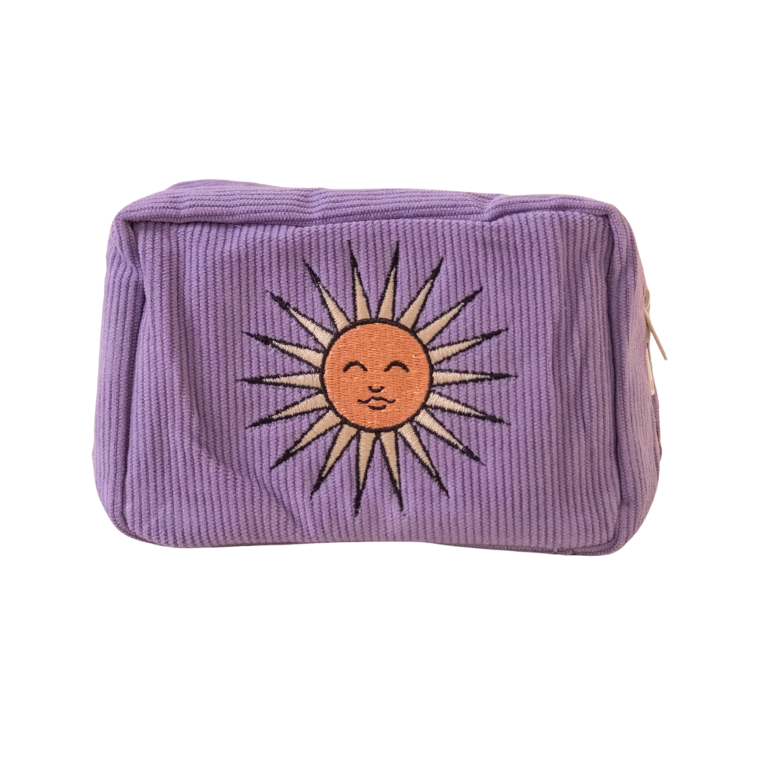 Purple pouch with embroidered sun design on the front, displayed against a white background