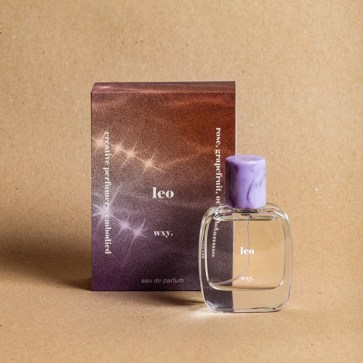 Leo Eau de Parfum bottle next to the packaging – bold and opulent fragrance